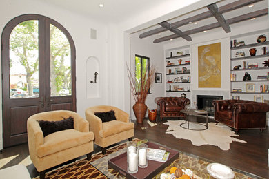 Example of a tuscan living room design in Los Angeles