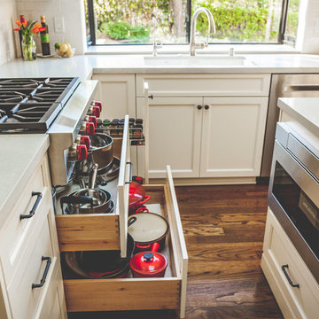 Storage for Pots & Pans Beneath Stainless Steel Stovetop