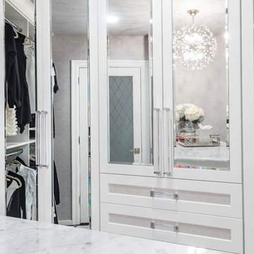 Dazzling Transitional His and Hers Master Closets