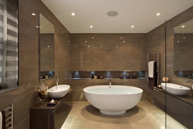 This is an example of a mid-sized modern master bathroom in Brisbane with open cabinets, brown cabinets, solid surface benchtops and brown benchtops.