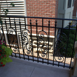 Solid stone stairs with ornamental iron railing - Products