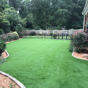 Synthetic Grass and Grotto Hardscapes