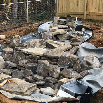 Backyard water feature, how to use the lay of the land to your advantage!