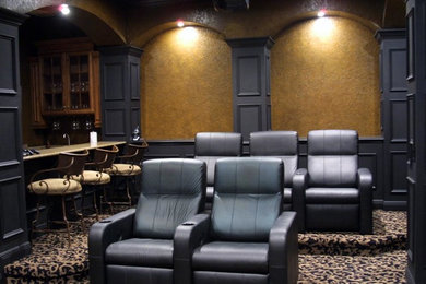 Small contemporary enclosed home theatre in Orlando with carpet, a projector screen and yellow walls.