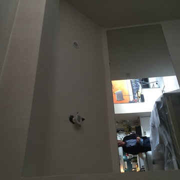 Lightwell in dark kitchen using velux windows
