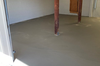 Minimalist attached two-car garage photo in Oklahoma City