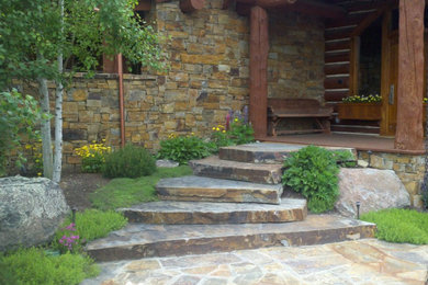 Design ideas for a mid-sized traditional partial sun front yard stone garden path in Other for summer.