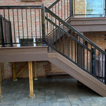 Fiberon sanctuary composite deck with aluminum glass railings.