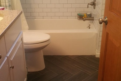 Ceramic tile porcelain tile bathroom photo in Other