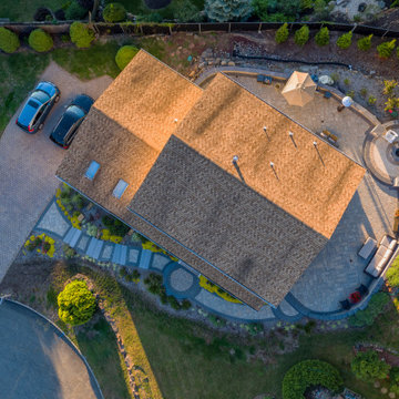 Dual patio with adjoining firepit feature
