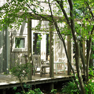 他の地域のアジアンスタイルのおしゃれなデッキ (オーニング・日よけ) の写真