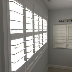 Solid vinly Plantation Shutters: PolyDesign - Interior Shutters