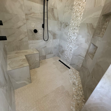 Curd-less walk-in shower; heated floors in bathroom + shower+bench LED