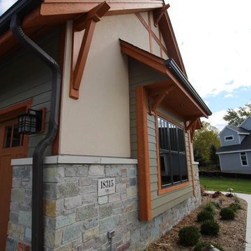 Arts and Crafts home with Stucco exterior