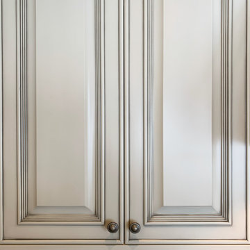 Elegant Antique White Cabinets with Natural Stone Countertop