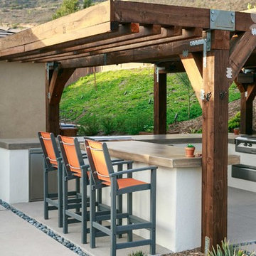 Outdoor Kitchen with Breakfast Bar and Pergola