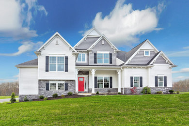 Example of an arts and crafts exterior home design in Other