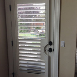 Shutters in transitional space. - Window Treatments