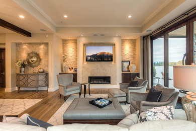 Inspiration for a large contemporary formal and open concept light wood floor living room remodel in Seattle with beige walls, a stone fireplace, a wall-mounted tv and a ribbon fireplace
