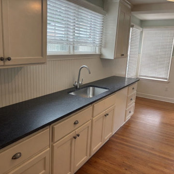 Dark speckled granite kitchen countertops