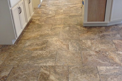 Example of a classic vinyl floor kitchen design in Sacramento