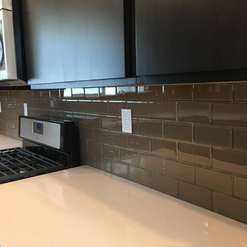 KITCHEN - Backsplash - Brown Glass Subway tile / Counter-to-Ceiling @ Window