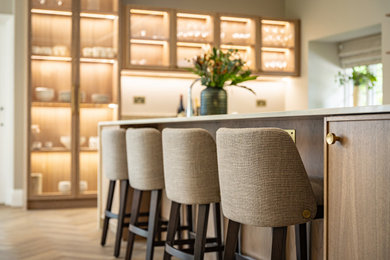 This is an example of a contemporary home bar in London.