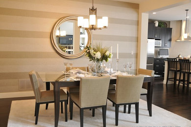 Inspiration for a dark wood floor dining room remodel in Vancouver with multicolored walls