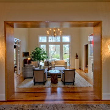 Dual &'Costa Coco Wall Sconces Flanking Opening to Living Room