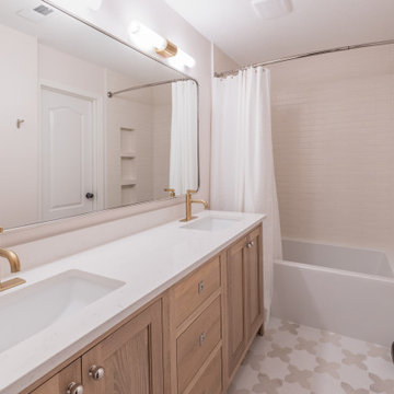 Playful Guest Bath Remodel with Fun Tile and Mixed Metals