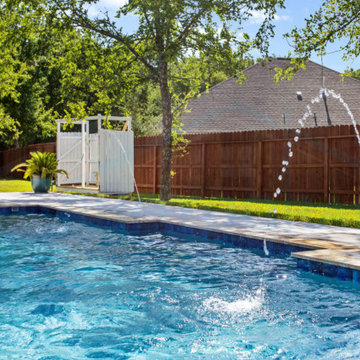 Deck Jets and Travertine Coping on Beautiful Geometric Pool
