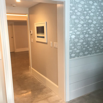 A fully equipped laundry room with a built ins
