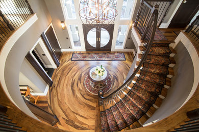 Example of a huge country staircase design in Other