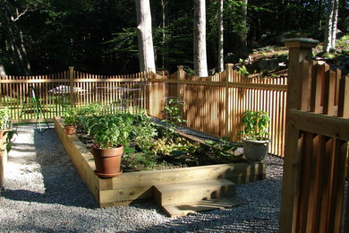 This is an example of a traditional garden in New York with a vegetable garden.