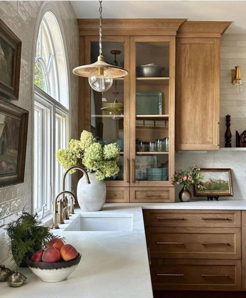 Balancing Wood Tones and Cream Cabinets