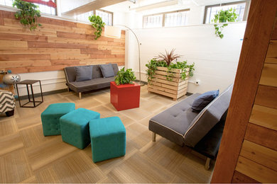 Inspiration for a mid-sized contemporary loft-style carpeted living room remodel in San Francisco with white walls, no fireplace and no tv