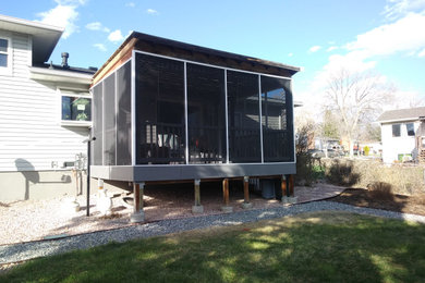 Mid-sized backyard deck photo in Other