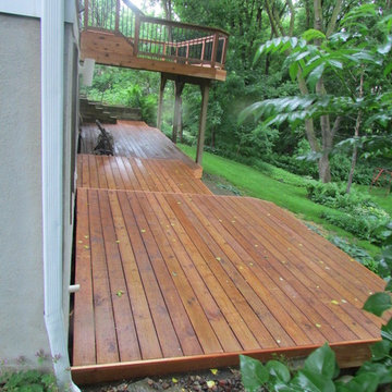 Cedar toned pressure treated deck with aluminum balusters 2