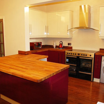 High Gloss bespoke kitchen with solid iroko tops