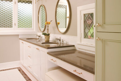 Mid-sized traditional master bathroom in Seattle with an undermount sink, recessed-panel cabinets, white cabinets, a one-piece toilet, ceramic floors and beige walls.