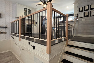 Staircase - mid-sized contemporary wooden straight mixed material railing staircase idea in New York with wooden risers