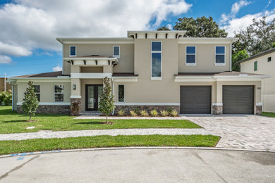 Example of a transitional exterior home design in Tampa