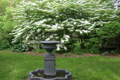 Photo of a farmhouse landscaping in Boston.