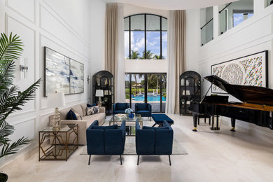 Large trendy marble floor and white floor living room photo in Miami with white walls