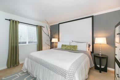 Mid-sized trendy master carpeted bedroom photo in Seattle with gray walls