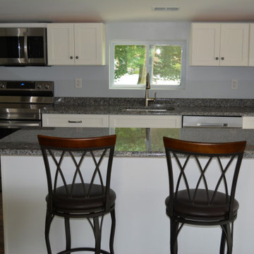Azul Platino Granite with White Icing Cabinetry
