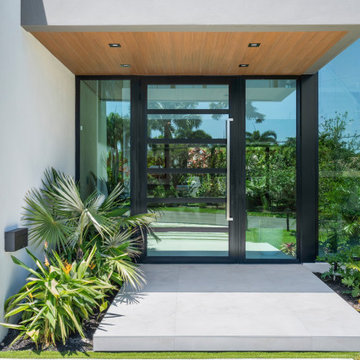 STAGGERED DESIGNER CONCRETE SLABS DRIVEWAY & FLOATING PORCH