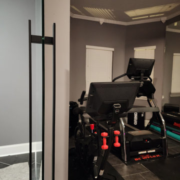 Installation of double glass doors in the basement (gym)