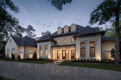 Example of a transitional home design design in Houston