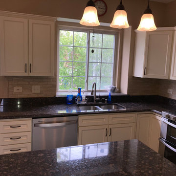 Traditional Kitchen Remodel Done in an Antique White with a Walnut Glaze